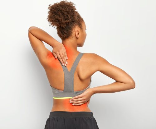 Woman in pain of back and Neck